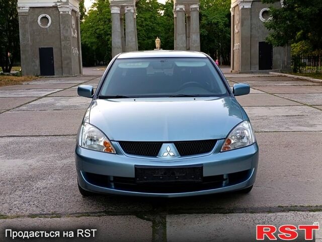 Зеленый Мицубиси Лансер, объемом двигателя 1.6 л и пробегом 187 тыс. км за 4999 $, фото 1 на Automoto.ua