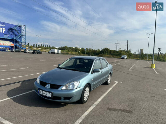 Зелений Міцубісі Lancer, об'ємом двигуна 1.58 л та пробігом 255 тис. км за 3700 $, фото 1 на Automoto.ua