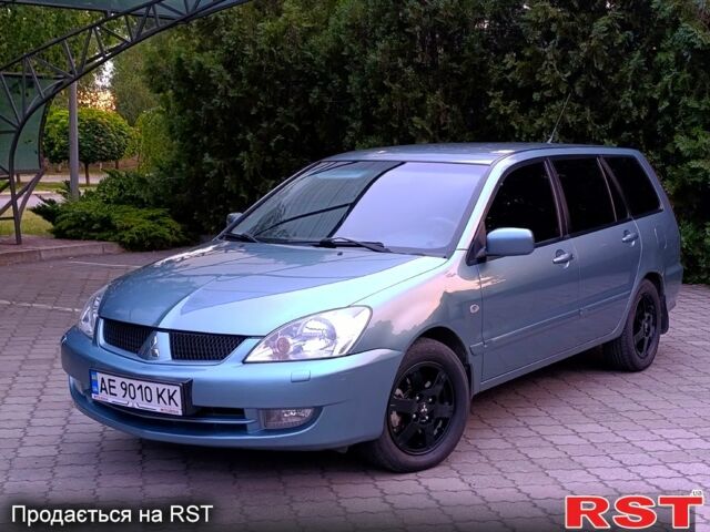 Зелений Міцубісі Lancer, об'ємом двигуна 1.6 л та пробігом 263 тис. км за 4400 $, фото 1 на Automoto.ua