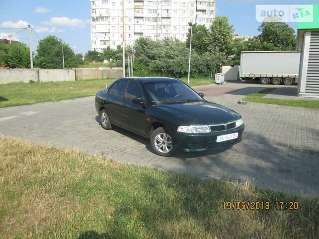 Зелений Міцубісі Lancer, об'ємом двигуна 1.3 л та пробігом 195 тис. км за 3800 $, фото 1 на Automoto.ua