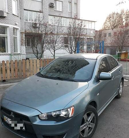 Зелений Міцубісі Lancer, об'ємом двигуна 2 л та пробігом 100 тис. км за 9000 $, фото 1 на Automoto.ua