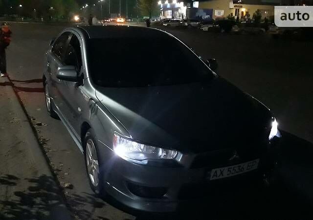 Зелений Міцубісі Lancer, об'ємом двигуна 2 л та пробігом 70 тис. км за 8729 $, фото 1 на Automoto.ua