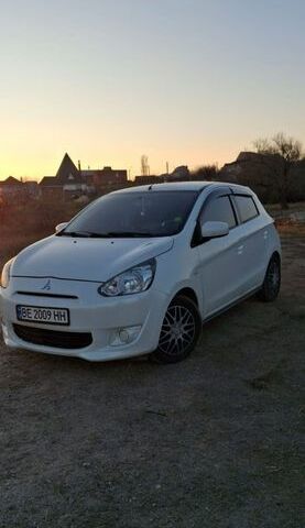 Білий Міцубісі Міраж, об'ємом двигуна 1 л та пробігом 105 тис. км за 7500 $, фото 1 на Automoto.ua