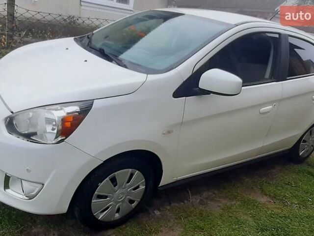 Белый Мицубиси Мираж, объемом двигателя 1.19 л и пробегом 148 тыс. км за 6550 $, фото 1 на Automoto.ua