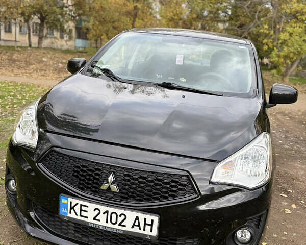 Черный Мицубиси Мираж, объемом двигателя 1.19 л и пробегом 38 тыс. км за 9000 $, фото 1 на Automoto.ua