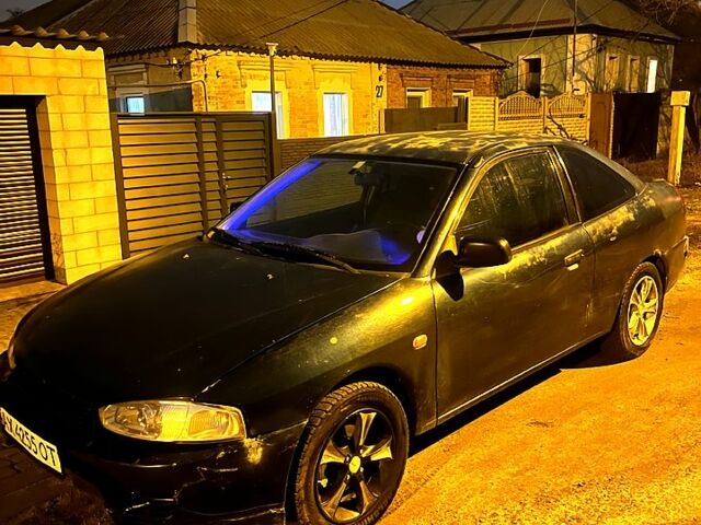 Зеленый Мицубиси Мираж, объемом двигателя 1.5 л и пробегом 165 тыс. км за 1900 $, фото 1 на Automoto.ua