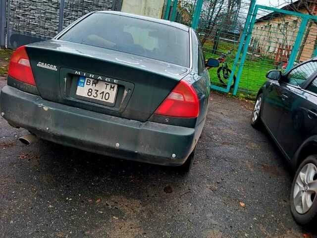 Зеленый Мицубиси Мираж, объемом двигателя 1.6 л и пробегом 340 тыс. км за 2850 $, фото 1 на Automoto.ua