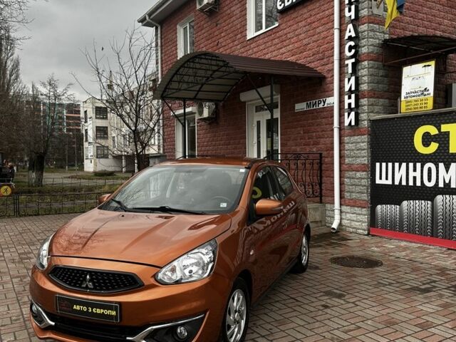 Помаранчевий Міцубісі Міраж, об'ємом двигуна 1.2 л та пробігом 110 тис. км за 6800 $, фото 1 на Automoto.ua