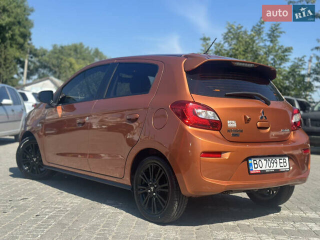 Оранжевый Мицубиси Мираж, объемом двигателя 1.2 л и пробегом 23 тыс. км за 10500 $, фото 1 на Automoto.ua