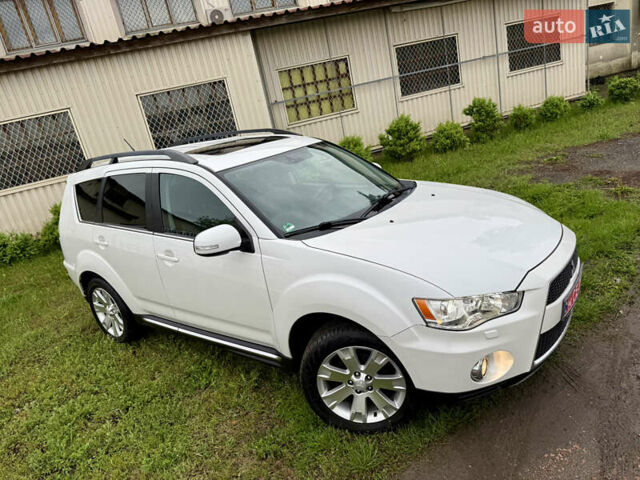 Білий Міцубісі Аутлендер ХЛ, об'ємом двигуна 2.36 л та пробігом 140 тис. км за 12450 $, фото 1 на Automoto.ua