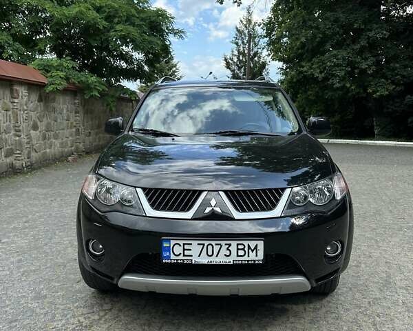 Чорний Міцубісі Аутлендер ХЛ, об'ємом двигуна 3 л та пробігом 264 тис. км за 9500 $, фото 1 на Automoto.ua