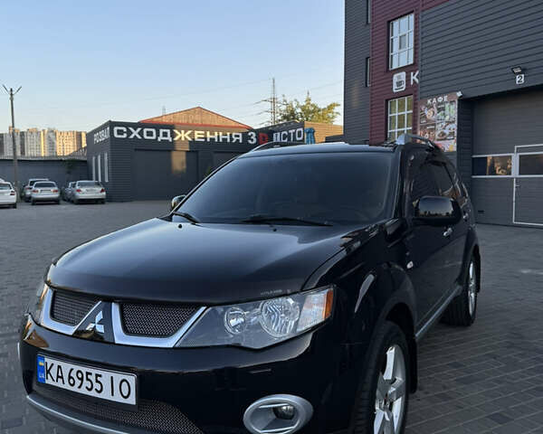 Чорний Міцубісі Аутлендер ХЛ, об'ємом двигуна 3 л та пробігом 243 тис. км за 12500 $, фото 1 на Automoto.ua