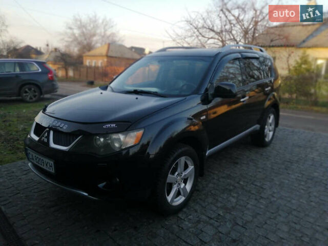 Чорний Міцубісі Аутлендер ХЛ, об'ємом двигуна 2.38 л та пробігом 228 тис. км за 7850 $, фото 1 на Automoto.ua