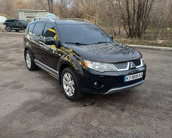 Чорний Міцубісі Аутлендер ХЛ, об'ємом двигуна 2.36 л та пробігом 117 тис. км за 11500 $, фото 1 на Automoto.ua