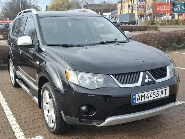 Черный Мицубиси Аутлендер ХЛ, объемом двигателя 2.36 л и пробегом 211 тыс. км за 10500 $, фото 1 на Automoto.ua