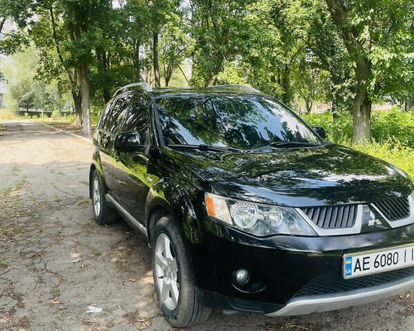 Чорний Міцубісі Аутлендер ХЛ, об'ємом двигуна 2.5 л та пробігом 185 тис. км за 8800 $, фото 1 на Automoto.ua