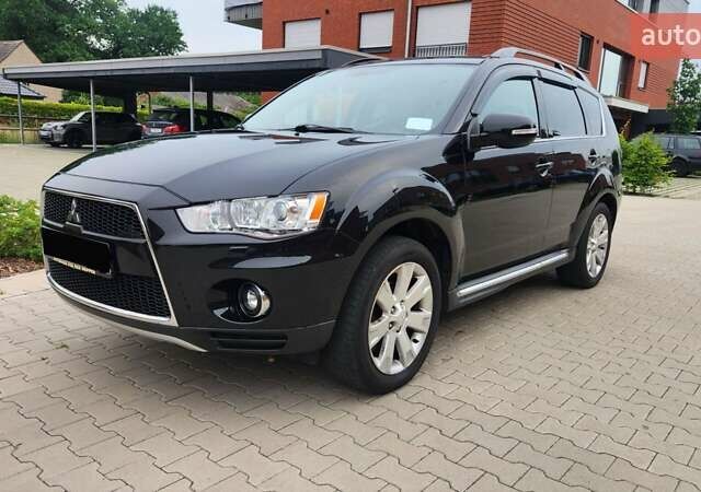 Мицубиси Аутлендер ХЛ 2010 в Днепре (Днепропетровске) на Automoto.ua Черный Мицубиси Аутлендер ХЛ, объемом двигателя 2.3 л и пробегом 193 тыс. км за 14999 $, фото 1 на Automoto.ua