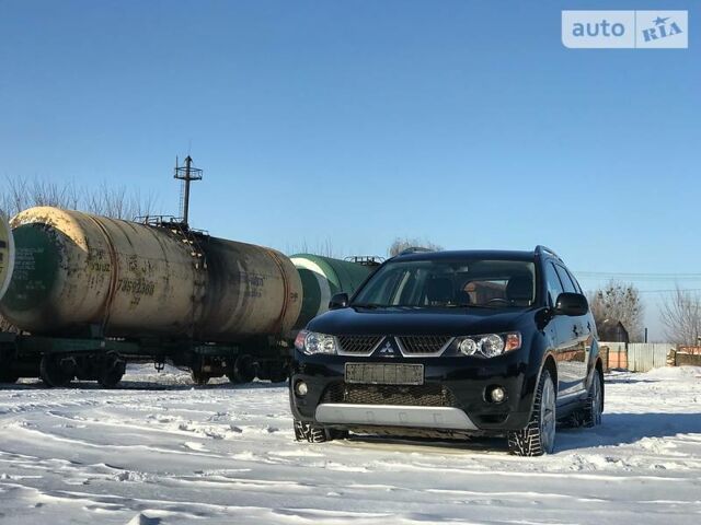 Чорний Міцубісі Аутлендер ХЛ, об'ємом двигуна 3 л та пробігом 113 тис. км за 13000 $, фото 1 на Automoto.ua