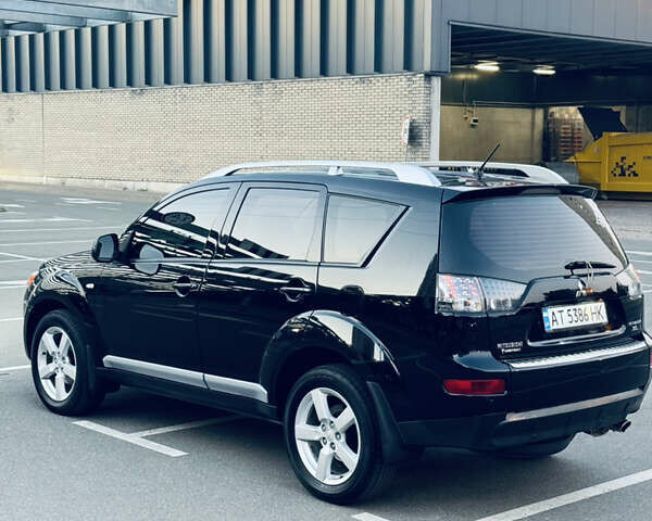 Мицубиси Аутлендер ХЛ, объемом двигателя 2.36 л и пробегом 237 тыс. км за 9000 $, фото 1 на Automoto.ua