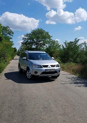 Сірий Міцубісі Аутлендер ХЛ, об'ємом двигуна 2.4 л та пробігом 162 тис. км за 11000 $, фото 1 на Automoto.ua