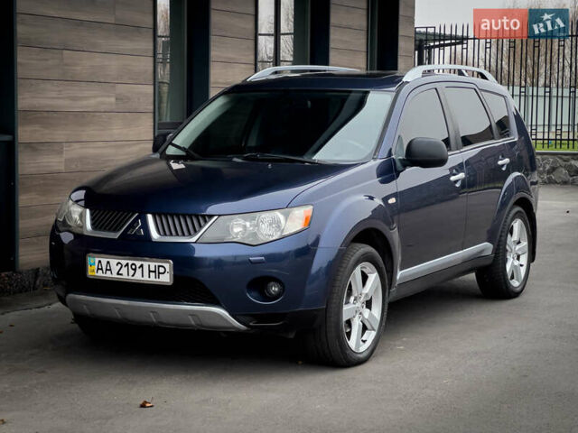 Синий Мицубиси Аутлендер ХЛ, объемом двигателя 2.4 л и пробегом 249 тыс. км за 8800 $, фото 1 на Automoto.ua