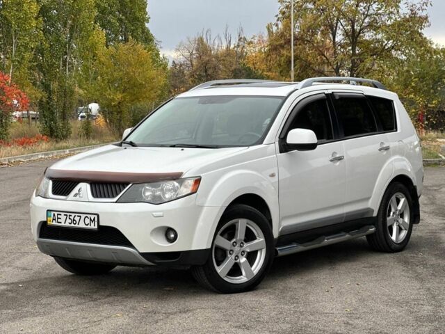Білий Міцубісі Аутлендер, об'ємом двигуна 2.4 л та пробігом 160 тис. км за 9299 $, фото 1 на Automoto.ua