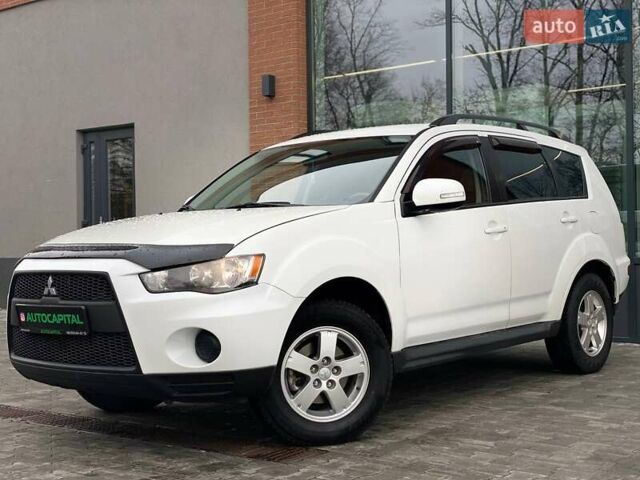 Білий Міцубісі Аутлендер, об'ємом двигуна 2 л та пробігом 248 тис. км за 10490 $, фото 1 на Automoto.ua
