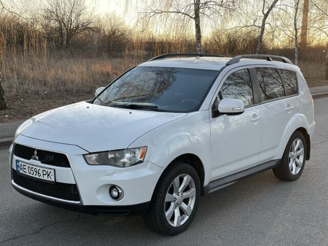 Белый Мицубиси Аутлендер, объемом двигателя 2.4 л и пробегом 161 тыс. км за 11700 $, фото 1 на Automoto.ua