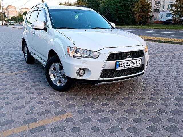 Белый Мицубиси Аутлендер, объемом двигателя 2.4 л и пробегом 187 тыс. км за 9700 $, фото 1 на Automoto.ua