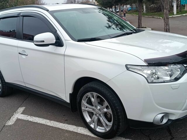 Білий Міцубісі Аутлендер, об'ємом двигуна 2.4 л та пробігом 112 тис. км за 15000 $, фото 1 на Automoto.ua