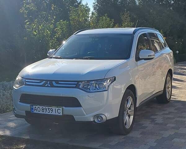 Белый Мицубиси Аутлендер, объемом двигателя 2.3 л и пробегом 247 тыс. км за 14100 $, фото 1 на Automoto.ua