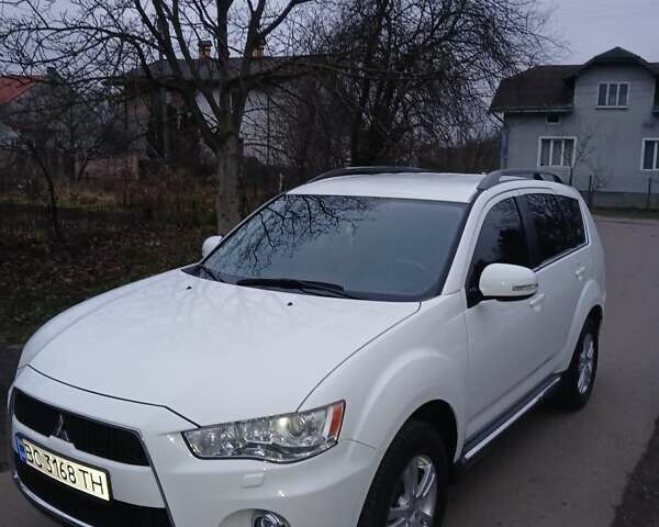 Білий Міцубісі Аутлендер, об'ємом двигуна 2.2 л та пробігом 181 тис. км за 12300 $, фото 1 на Automoto.ua