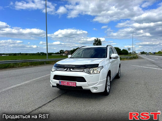 Білий Міцубісі Аутлендер, об'ємом двигуна 2.3 л та пробігом 212 тис. км за 13900 $, фото 1 на Automoto.ua