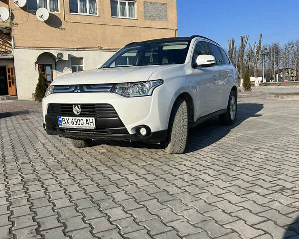 Белый Мицубиси Аутлендер, объемом двигателя 2.3 л и пробегом 149 тыс. км за 13800 $, фото 1 на Automoto.ua