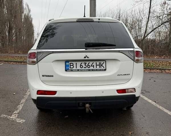 Білий Міцубісі Аутлендер, об'ємом двигуна 2.3 л та пробігом 255 тис. км за 13000 $, фото 1 на Automoto.ua