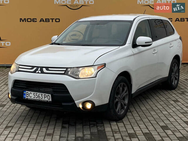 Белый Мицубиси Аутлендер, объемом двигателя 2.36 л и пробегом 215 тыс. км за 9999 $, фото 1 на Automoto.ua