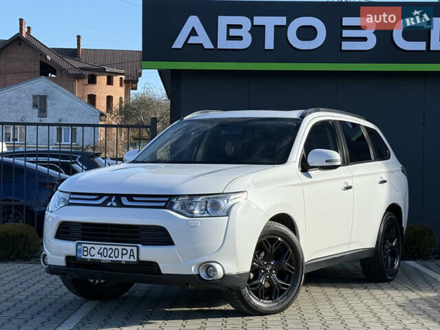 Белый Мицубиси Аутлендер, объемом двигателя 2.4 л и пробегом 148 тыс. км за 12900 $, фото 1 на Automoto.ua
