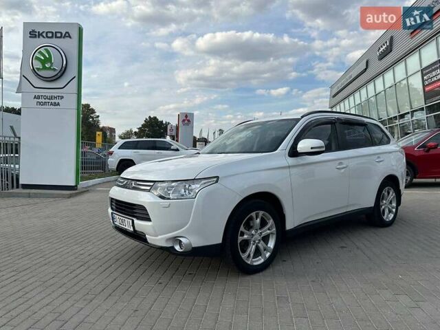 Белый Мицубиси Аутлендер, объемом двигателя 2.4 л и пробегом 183 тыс. км за 13100 $, фото 1 на Automoto.ua
