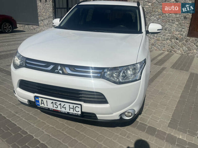 Білий Міцубісі Аутлендер, об'ємом двигуна 2 л та пробігом 127 тис. км за 14000 $, фото 1 на Automoto.ua