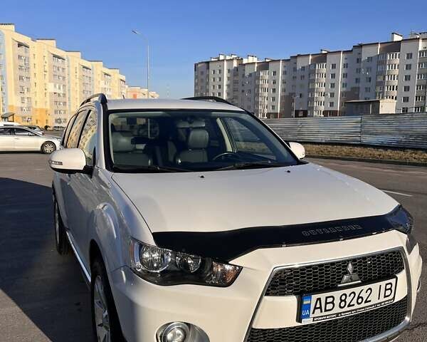 Белый Мицубиси Аутлендер, объемом двигателя 2.4 л и пробегом 340 тыс. км за 9900 $, фото 1 на Automoto.ua