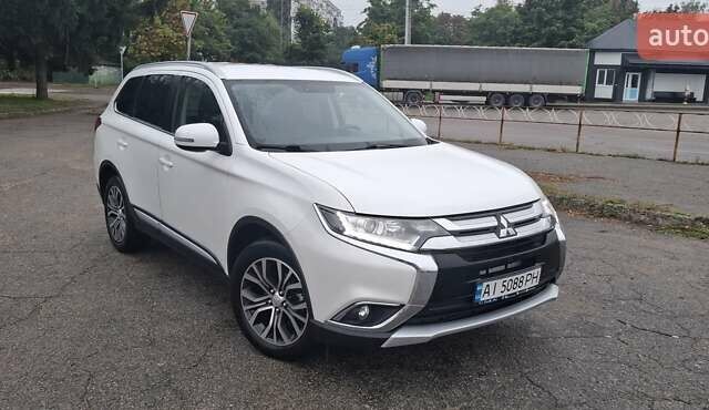 Білий Міцубісі Аутлендер, об'ємом двигуна 2.3 л та пробігом 158 тис. км за 18200 $, фото 1 на Automoto.ua
