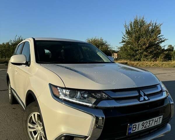 Білий Міцубісі Аутлендер, об'ємом двигуна 2.4 л та пробігом 91 тис. км за 15900 $, фото 1 на Automoto.ua