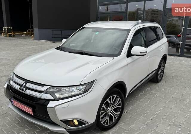 Белый Мицубиси Аутлендер, объемом двигателя 2.2 л и пробегом 199 тыс. км за 17999 $, фото 1 на Automoto.ua