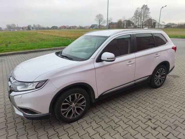 Белый Мицубиси Аутлендер, объемом двигателя 2 л и пробегом 135 тыс. км за 10200 $, фото 1 на Automoto.ua