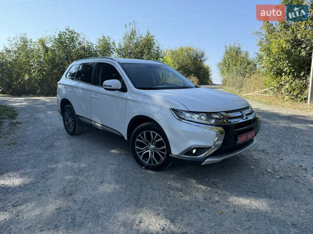 Білий Міцубісі Аутлендер, об'ємом двигуна 2.2 л та пробігом 240 тис. км за 18999 $, фото 1 на Automoto.ua