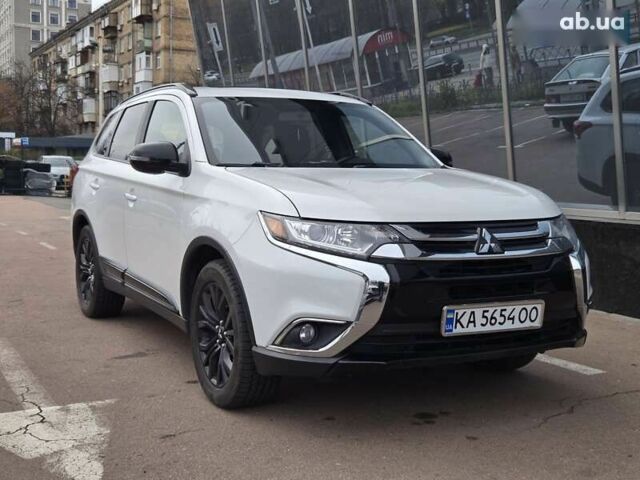Белый Мицубиси Аутлендер, объемом двигателя 2.4 л и пробегом 115 тыс. км за 19300 $, фото 1 на Automoto.ua