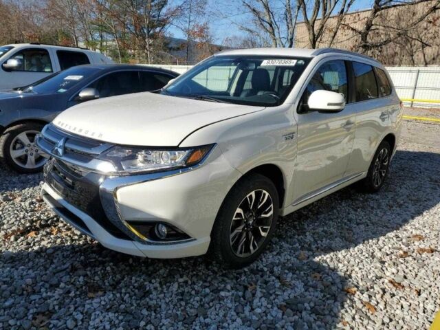 Белый Мицубиси Аутлендер, объемом двигателя 2 л и пробегом 129 тыс. км за 5100 $, фото 1 на Automoto.ua