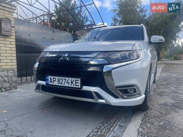 Білий Міцубісі Аутлендер, об'ємом двигуна 2 л та пробігом 58 тис. км за 23500 $, фото 1 на Automoto.ua