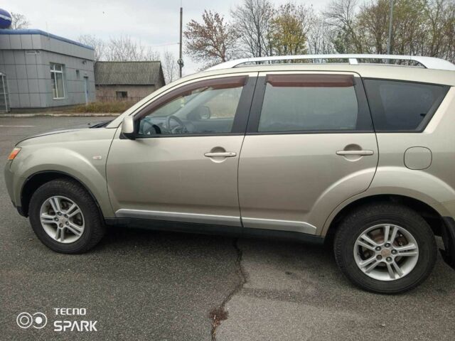 Бежевий Міцубісі Аутлендер, об'ємом двигуна 2.4 л та пробігом 290 тис. км за 6800 $, фото 1 на Automoto.ua