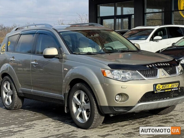 Бежевий Міцубісі Аутлендер, об'ємом двигуна 2.4 л та пробігом 195 тис. км за 8500 $, фото 1 на Automoto.ua